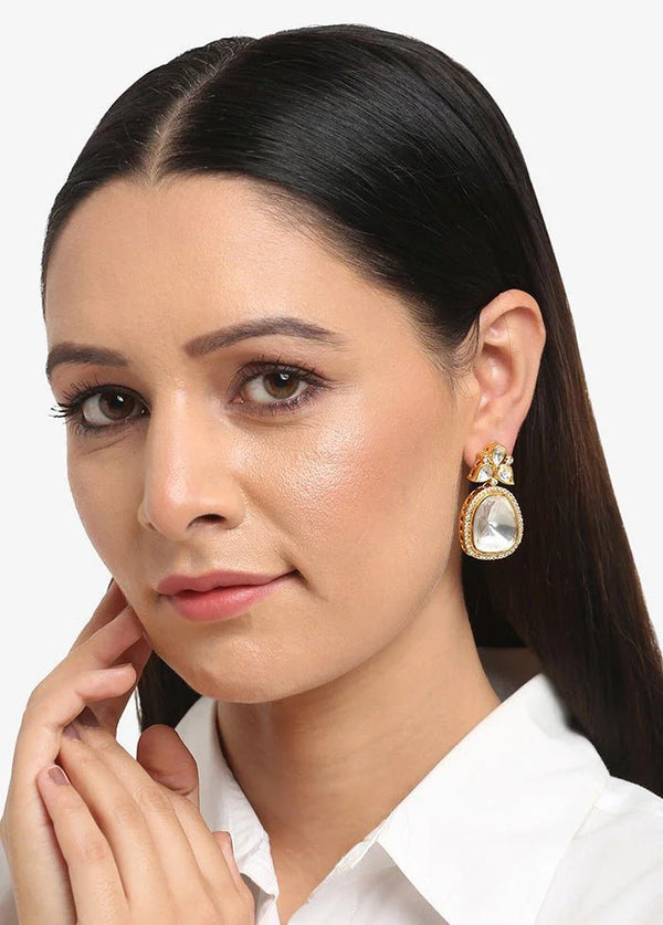 Priya Uncut Polki Studs – elegant handcrafted bridal earrings featuring traditional gold plating and uncut Polki stones, perfect for weddings and festive occasions.